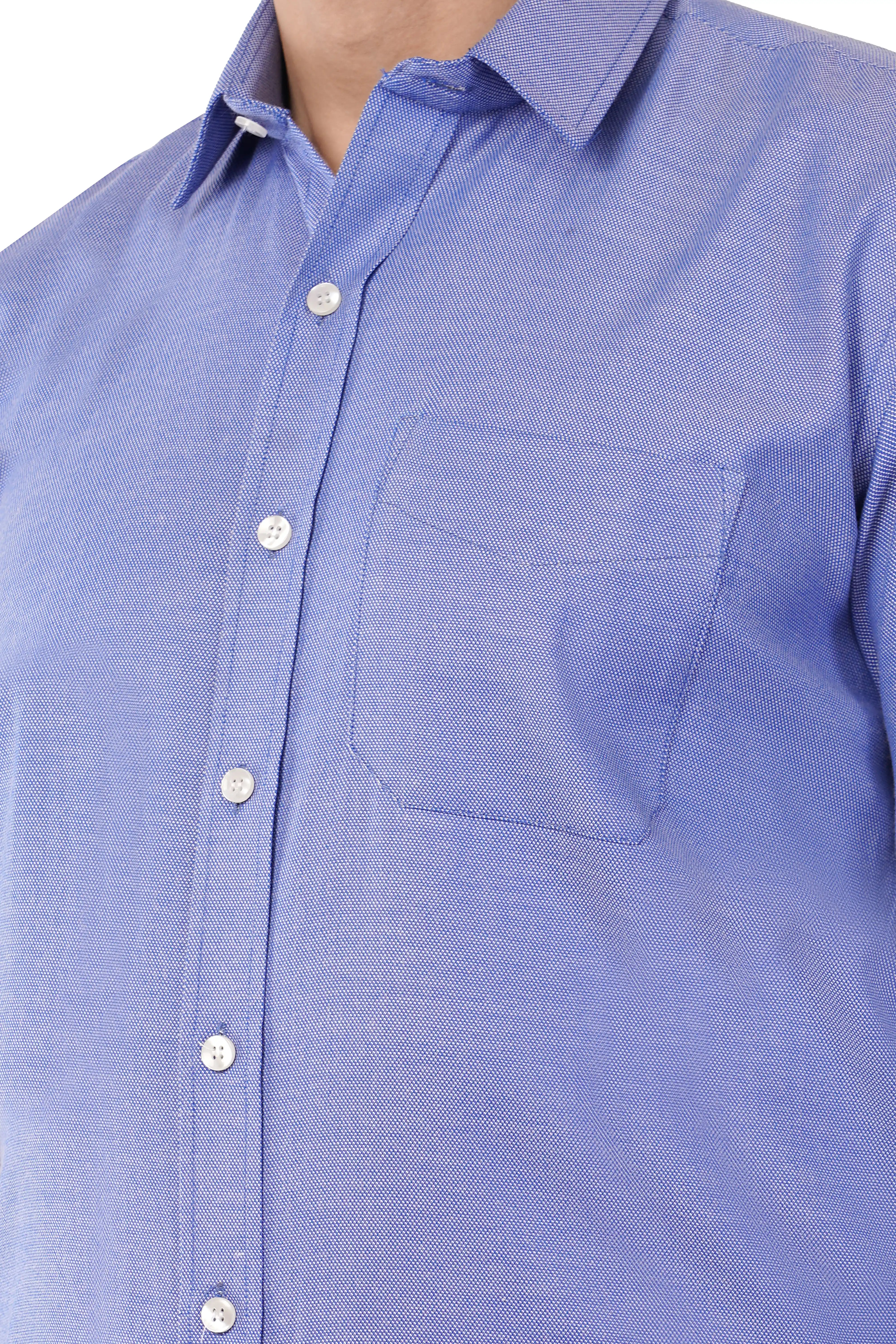 Close-up of a blue button-up shirt from Atacama with a pocket on a white background