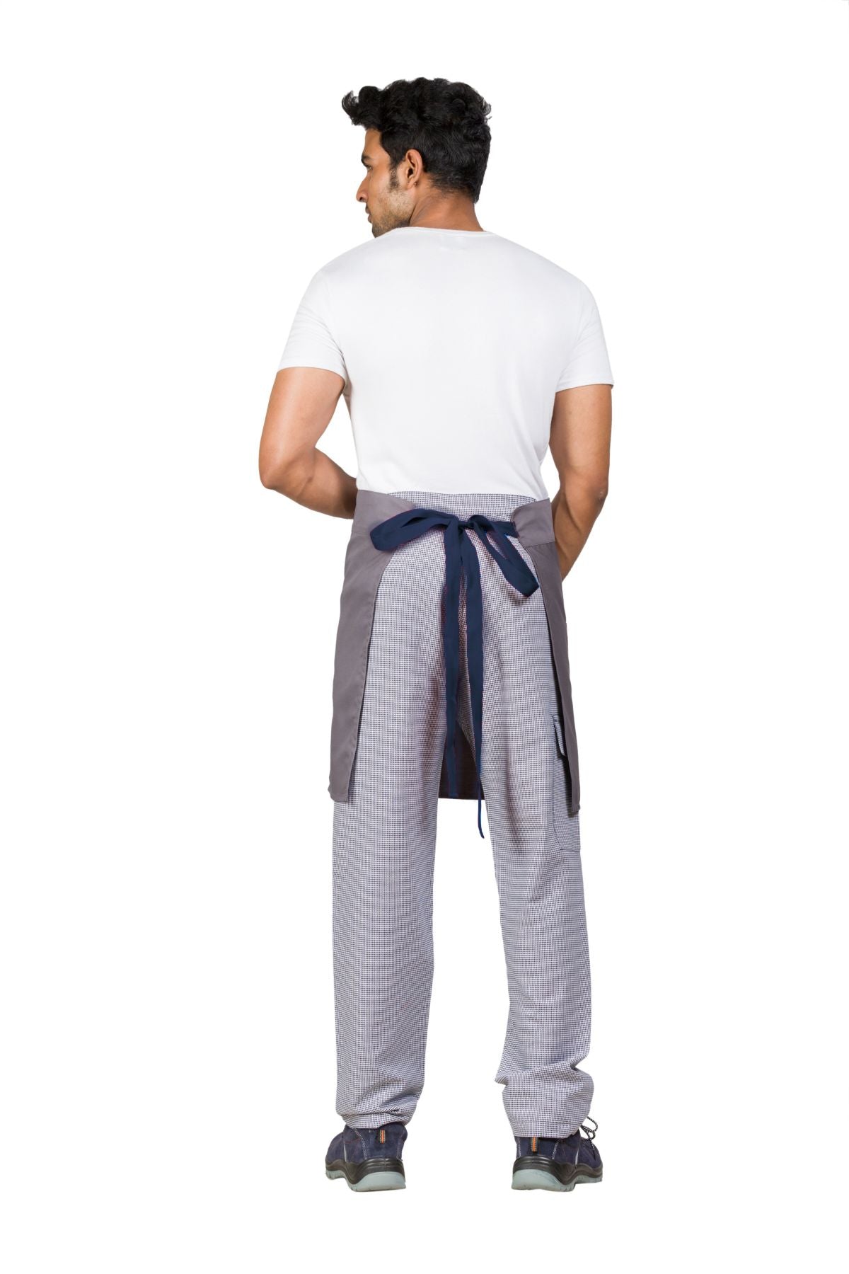 Limmon Pearl Grey Waist Apron with pockets, made of cotton blend twill, worn by a man with a white shirt and patterned pants.