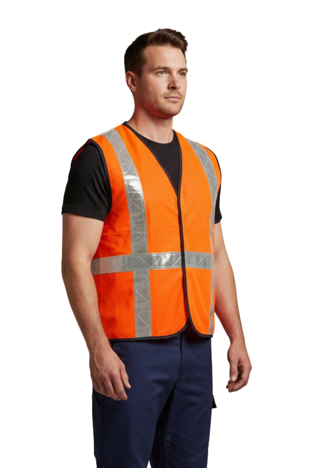Man wearing an orange industrial hi-visibility vest with silver reflective tapes over a black shirt and blue pants