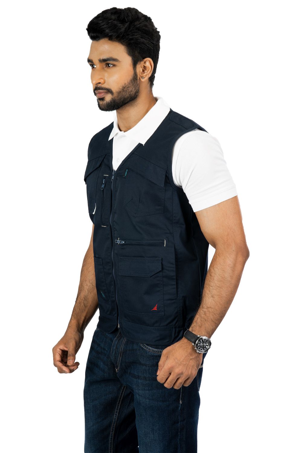 Atlanta Multi-Utility Vest, reflective cotton blend twill, features multiple pockets, worn over a white polo shirt.
