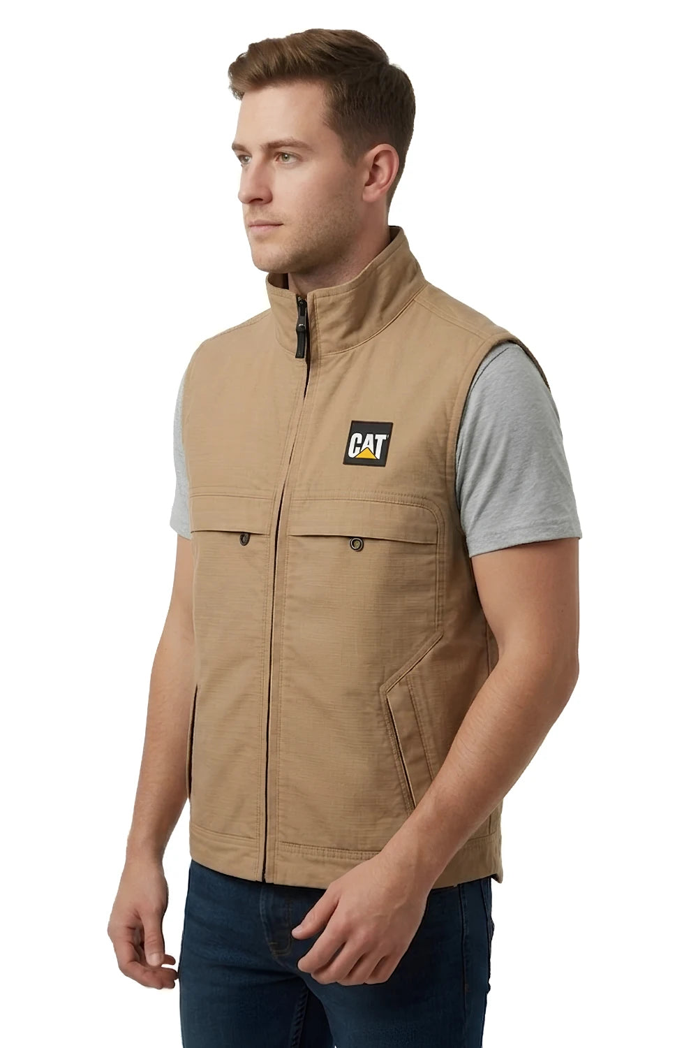 Side view of male model wearing khaki safari vest with front zip closure and utility pockets, industrial workwear style