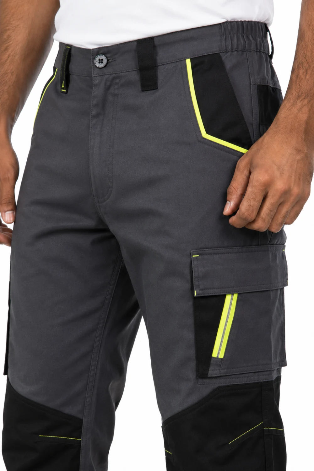 Men's Benson smoke grey and black Hamour trousers with yellow trim, cargo pockets, and button closure, worn by model