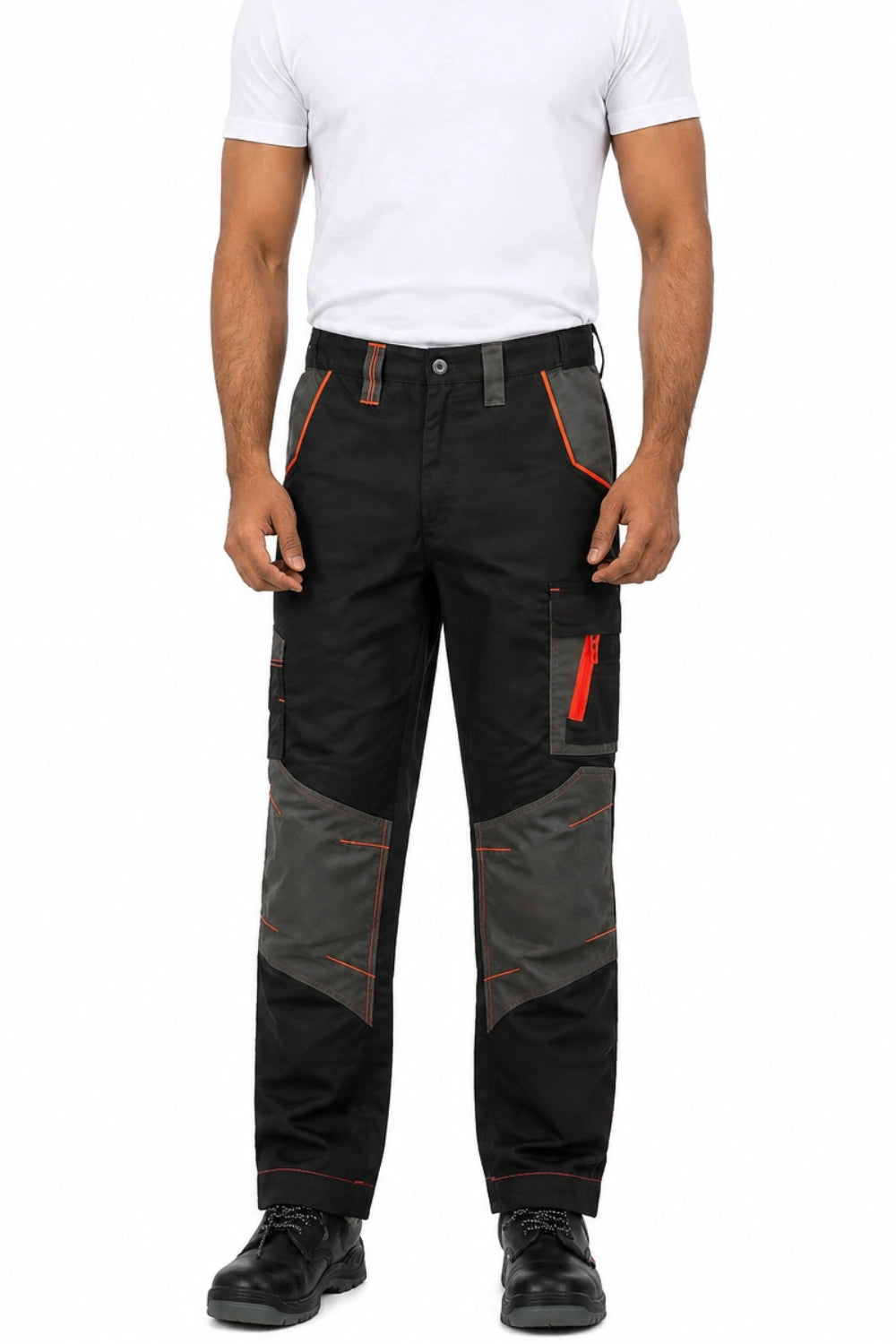 Black and dark grey workwear trousers with orange stitching, multiple pockets, worn by a man in a white t-shirt and black