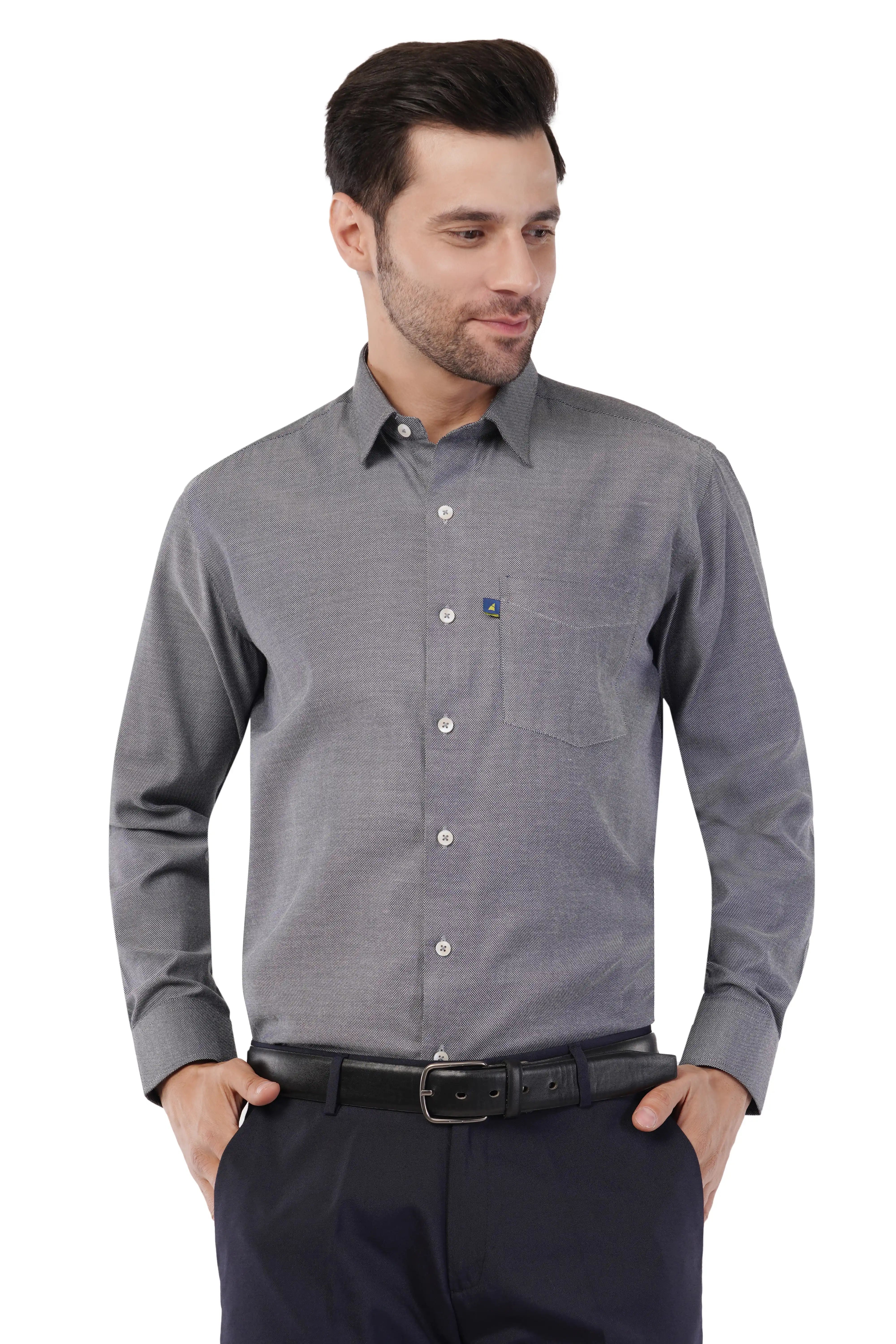 Man wearing a gray checkered Atacama formal shirt with a white background