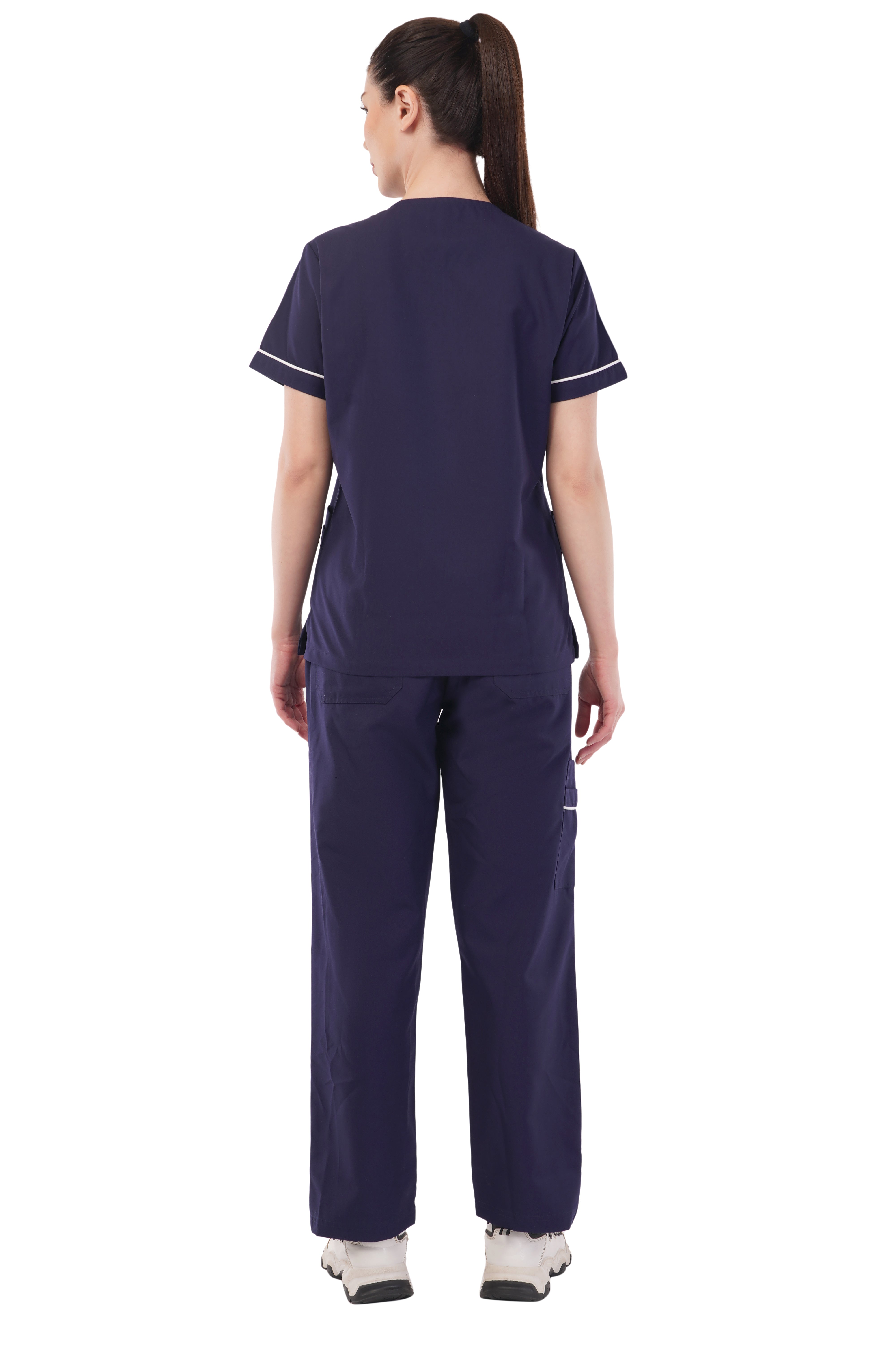 Navy stretchy scrub set by Atacama, featuring a lined top and pants, made of polyester/spandex blend.